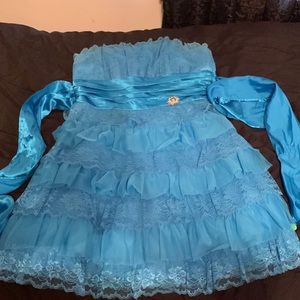 A periwinkle blue color lace dress. Size 14/15 worn once, from a local boutique.